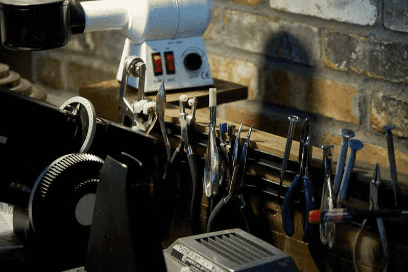 workstation close up with eyeglasses tools